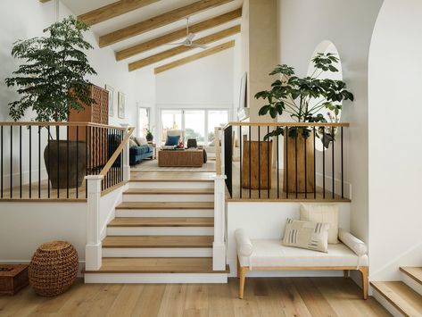 ✨Before & After✨ This home had all the quirky elements of a 70’s home…built-in stair planters, sunken living room, round hole between rooms! Some features were easy to transform into the new design, others were easy for us to say bye bye to ☺️ Go to stories to see the process of this entry staircase! 🛠️: @coatinc 👩🏻‍🎨: @a_designed_space 📸: @taylorallancreative Stairs To Sunken Living Room, Step Up Into Living Room, View From Entryway, Half Wall Sunken Living Room, Sunken Foyer Entry, Entrance Straight Into Living Room, Steps Down Into Living Room, Sunken Living Room Railing Ideas, Step Up Living Room