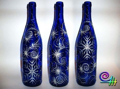 Painted wine bottles Blue Wine Bottle Crafts, Pretty Snowflakes, Wine Bottle Project, Blue Wine Bottles, Wine Bottle Glasses, Bottle Projects, Wine Bottle Ideas, Wine Bottle Corks, Painted Bottles