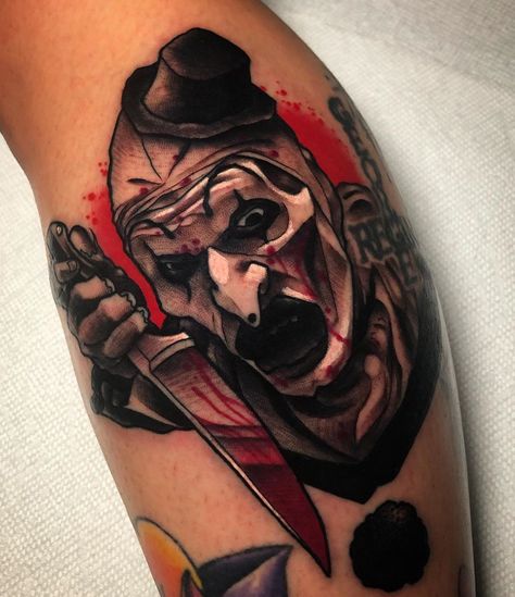 Neotraditional tattoo by Jeff Saunders Horror Tattoo Ideas, Chucky Tattoo, Horror Movie Tattoos, Tattoo Artist Tattoo, Clown Tattoo, Movie Tattoo, Movie Tattoos, Scary Tattoos, Artist Tattoo