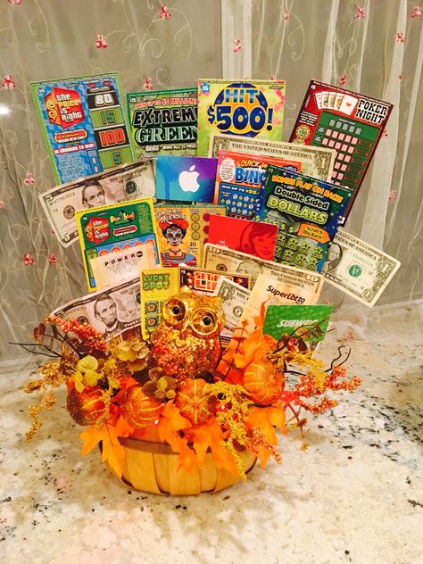 Fall basket with lottery tickets, money and gift cards...😊 Fall Gift Card Basket Ideas, Halloween Lottery Ticket Gift Ideas, Halloween Lottery Ticket Basket, Fall Lottery Ticket Basket, Fall Fundraiser Basket Ideas, Lottery Ticket Gift Ideas Raffle Baskets, Fall Fundraising Ideas, Lottery Gift Basket, Lottery Ticket Raffle Basket