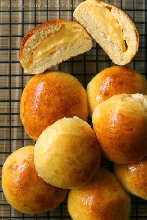 Folks, I am back with another delicious bread this month! This month’s host is Jenni of Pastry Chef Online who chose ‘stuffed breads’ as the theme and I was absolutely thrilled. Imagine all the delicious stuffed breads that I was going to discover! Everyone was just as excited as I was on our baking group. For... Japanese Custard, Cream Pan, Cream Buns, Cream Bun, Macedonian Food, Resep Diet, Custard Filling, Bread Bun, Japanese Dessert