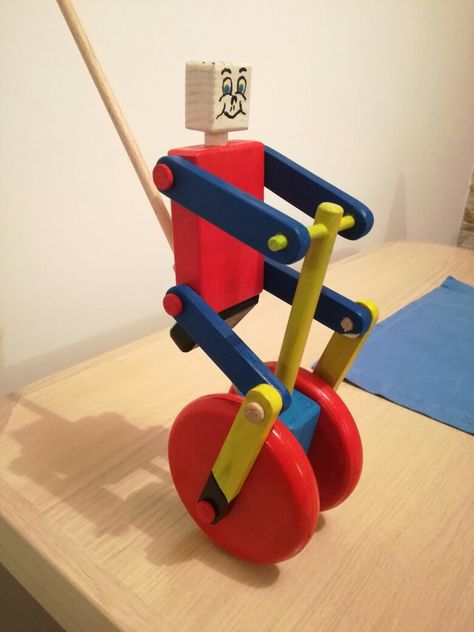 Wooden cyclist push toy Wooden Push Toys, Wooden Toys Design, Wood Toys Plans, Making Wooden Toys, Wooden Toys Plans, Push Toys, Woodworking Toys, Wooden Games, Kids Wooden Toys