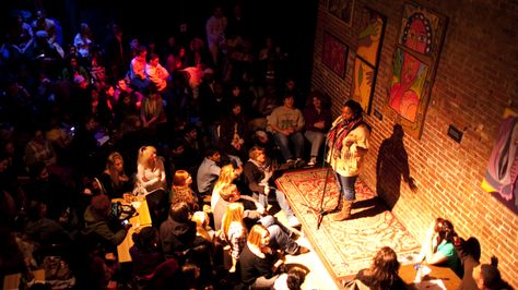 It embodies the belief that anyone can take the stage and interpret one of the most accessible art forms and "reveal poetry as a living art." Poets Cafe, Poetry Slam, Open Mic Night, Spoken Word Poetry, Nyc Fall, Slam Poetry, Black And White Coffee, Friday Nights, Black Lives Matter Protest