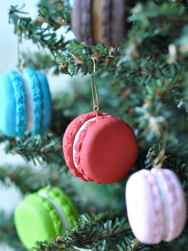 Give your tree a French twist by adding these colorful sweets! These faux macaron ornaments can be made using either polymer clay or fondant. Get the tutorial at Creative Juice.   - CountryLiving.com Candy Themed Christmas Tree Ornaments, Clay Candy Ornaments, Diy Cookie Ornaments, Diy Christmas Candy Ornaments, Diy Tree Ornaments Christmas, Diy Candy Ornaments Christmas, Macaron Ornaments, Christmas Candy Ornaments, Easy To Make Christmas Ornaments