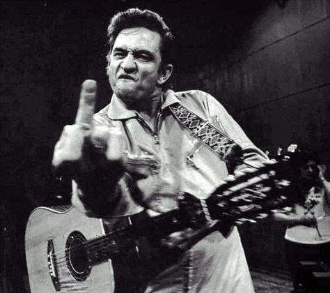 some say, 'the best rock n roll photo of all time'...by Jim Marshall Johnny Cash Poster, Johnny Cash Middle Finger, Public Enemies, Jim Marshall, San Quentin, Musica Rock, Men In Black, Rock N’roll, I'm With The Band