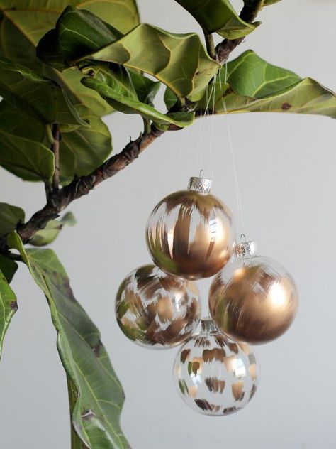 10 Fun Ways to Dress Up a Glass Ornament | HGTV Confetti Ornaments, Homemade Christmas Tree, Clear Christmas Ornaments, Tissue Paper Tassel Garland, Clear Glass Ornaments, Diy Christmas Ornaments Easy, Clear Ornaments, Glass Christmas Tree Ornaments, Gold Diy