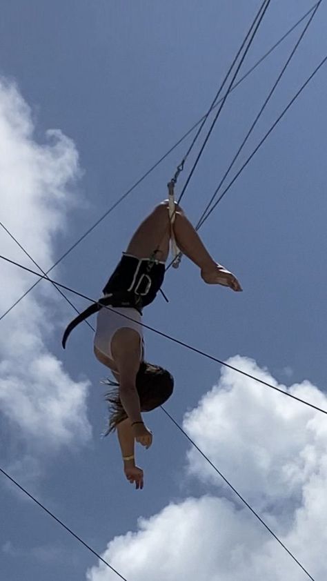 Midswing flying trapeze knee hang on ropes. Flying Trapeze, Aerial Arts, Hang On