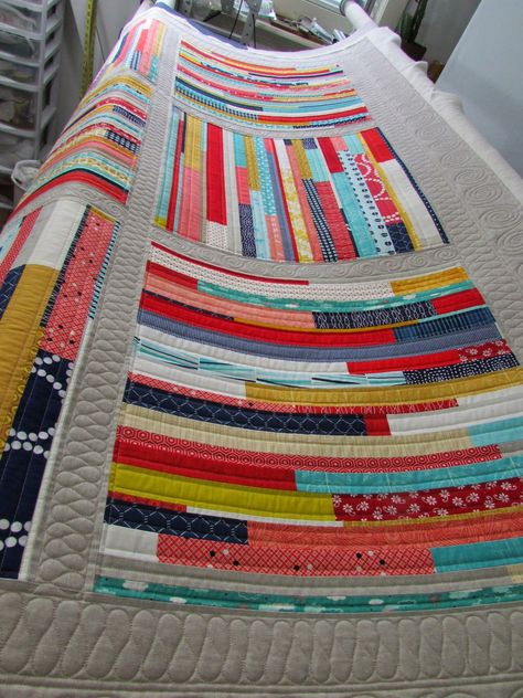 "Woven" quilt by Kati Spencer in Scraps, Inc. (Lucky Spool Media).  Quilted by Barbie Mills | The Quilting Mill Modern Jelly Roll Quilts, Improvisational Quilting, Scrap Patchwork, Woven Quilt, Quilt Scraps, Crumb Quilt, Improv Quilting, Bohemian Quilt, String Quilt