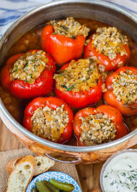 This super easy recipe for stuffed peppers is bound to become a family favorite! My family has been making this dish for decades and it never gets old. It’s one of those warming, comfort food recipes that you just keep coming back to, especially during the cold winter months! It’s also a very special recipe, […] Black Bean Ground Beef, Beef Snacks, Ground Beef Breakfast, Stuffed Peppers With Rice, Easy Stuffed Peppers, Ground Beef Dinner Recipes, Ukrainian Food, Eastern European Recipes, Recipe Art