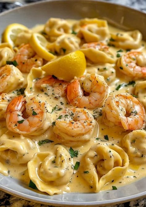 Indulge in creamy Shrimp Tortellini drizzled with a zesty lemon garlic sauce—quick, easy, and bursting with flavor! Perfect for a gourmet weeknight dinner. #ShrimpPasta #CreamSauce #QuickDinner #SeafoodRecipes #ItalianCuisine Shrimp Dinner Ideas Pasta, Tortellini With Shrimp Recipes, Tortellini Recipes Vodka Sauce, Shrimp Tortellini With Lemon Garlic Cream Sauce, Shrimp With Ravioli Recipes, Shrimp With Tortellini Recipe, Shrimp Tortellini With Garlic Sauce, Shrimp And Cheese Tortellini Recipes, Easy Shrimp Tortellini Recipes