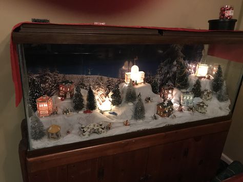 Repurposed fish aquarium Christmas Village In Fish Tank, Fish Tank Christmas Decorations, Repurpose Aquarium Tanks Ideas, Fish Tank Upcycle Ideas, Aquarium Repurpose Ideas, Christmas Fish Tank Decoration, Repurpose Fish Tank Ideas, Repurposed Aquarium Tanks, Gosh Tank Ideas