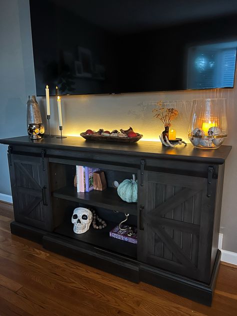 Halloween tv stand decor! Similar items linked 🎃 Console table decor, Halloween candles, Halloween shelf styling, Halloween finds, tv stand styling Follow my shop @courtneymcansh on the @shop.LTK app to shop this post and get my exclusive app-only content! Halloween tv stand decor! Similar items linked 🎃 Console table decor, Halloween candles, Halloween shelf styling, Halloween finds, tv stand styling Follow my shop @courtneymcansh on the @shop.LTK app to shop this post and get my exclusi Halloween Tv Stand, Halloween Tv Stand Decor, Tv Stand Styling, Table Decor Halloween, Halloween Shelf, Console Table Decor, Candles Halloween, Tv Stand Decor, Console Table Decorating