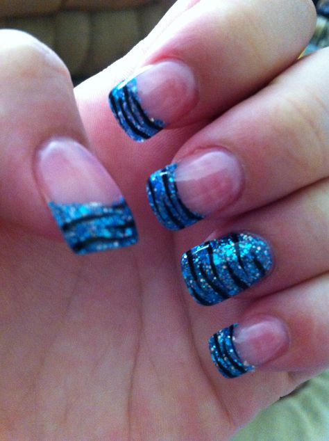 Glitter blue nails with tiger stripes. 2000s French Tip Nails Short, Blue Glitter Nails Short, Blue 2000s Nails, Pretty Blue Nails Short Glitter, Blue Emo Nails, Blue Nails Y2k, Glitter Blue Nails, Glitter Nails Short, Blue Zebra Print Nails