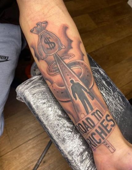 Road To Riches Money Tattoo Money Tattoo Forearm, Road To Success Tattoo, Roads To Riches Tattoo, Road To Riches Tattoo Stencil, Road To Riches Tattoo Design, Rags To Riches Tattoo, Money Over Everything Tattoos, Rich Tattoo Ideas, Pathway Tattoo