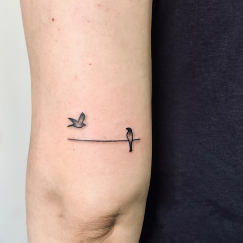 Tony Bird Tattoo, Bird Tattoo Simple Outline, Bird On Line Tattoo, Bird On A Line Tattoo, Micro Bird Tattoos For Women, Bird On Wire Tattoos, Birds On Powerline Tattoo, Single Bird Tattoo, Micro Bird Tattoo