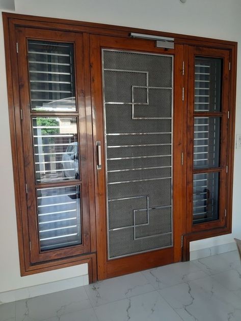 Wood Grill Door Design, Window Door Design Wooden Indian, Main Door Net Design, Main Grill Door Design Entrance, Net Gate Design, Net Doors For Main Door, Mesh Doors Design For Main Door, Front Double Door Design Wood Indian, Mesh Door Design Wooden