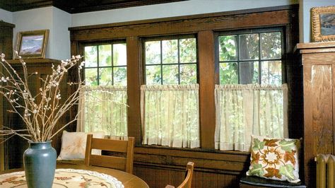 Café (half or sash) curtains of raw scrim, hand hemstitched, are shirred onto plain brass rods. Craftsman Window Treatments, Craftsman Curtains, Craftsman Trim Window, Craftsman Style Windows, Craftsman Windows, Craftsman Window, Craftsman Window Trim, Craftsman Interiors, Craftsman Style Furniture