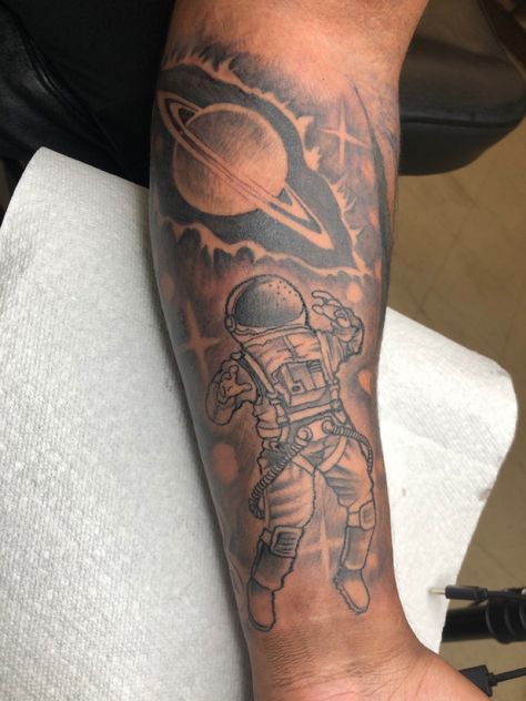 Astronaut with Saturn tattoo outer space Space Forearm Tattoo Men, Mens Upper Sleeve Tattoo, Astronaut Tattoos For Men, Space Filler Tattoo Sleeve, Tattoo Of Saturn, Men’s Space Tattoo, Mens Space Tattoos, Astronaut Sleeve Tattoo, Outer Space Tattoo Ideas