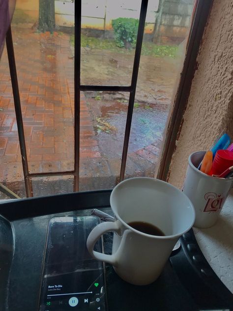 study motivation. rain. rainy days aesthetic. lana Del rey fan. born to die. born to die by lana del rey. coffee aesthetic. window picture. romantasizing studying. cup of coffee.  studying aesthetic. Rainy Day Coffee Aesthetic, Coffee In Rainy Day, Romantasizing Studying, Rainydays Aesthetic, Rainy Day Coffee, Rainy Day At Home, Rain And Coffee, Coffee Music, Coffee Aesthetic