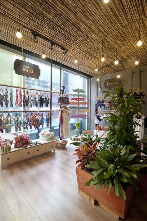 Lagunarosa store by Plasma, Bogotá   Colombia store design Yoga Chic, Swimsuit Stores, Window Display Retail, Bamboo Ceiling, Boutique Business, Store Design Boutique, Store Window Displays, Boutique Decor, Store Interiors