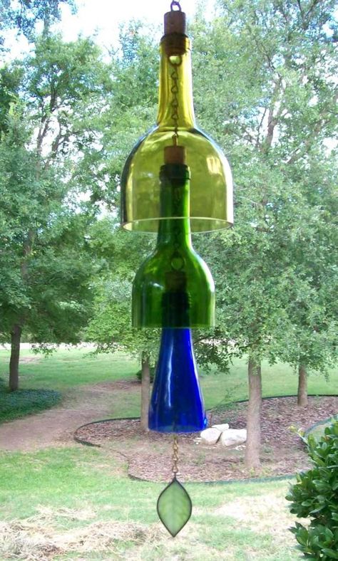 You think that the old bottles can be only used to store the jams again. Then you are wrong. Bottles and jars will be turned into many useful things that maybe you haven’t thought before. Why not check the DIY crafts out here and make your old jars useful. What’s more, DIY crafts need your … Dremmel Art, Wine Bottle Wind Chimes, Diy Wind Chimes, Wine Bottle Art, Bottle Corks, Wine Bottle Crafts, Wine Making, Wind Chime, Bottle Art