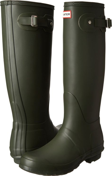 PRICES MAY VARY. Each pair is handcrafted from 28 individual parts Fully waterproof Textile lined to deliver exceptional fit & comfort Original calendared outsole offers high-traction across rough terrain Crafted from natural vulcanised rubber Adjustable strap to enhance leg fit Green Hunter Boots, Olive Boots, Tall Rain Boots, Hunter Boot, Matte Green, Rubber Boot, Wellington Boots, Warm Socks, Women Hunters