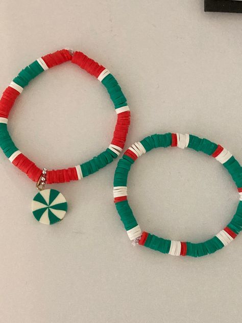 They are Christmas bracelets you can wear them you they can be good gifts 🎁 they are stretchy and strong and made out of clay beads Bracelets For Christmas, Christmas Clay Beads Bracelet, Candy Cane Bracelet, Christmas Bracelets Clay Beads, Clay Bracelet Christmas, Clay Beads Christmas, Preppy Christmas Bracelet Ideas, Clay Bracelet Ideas Christmas, Christmas Clay Bead Ideas