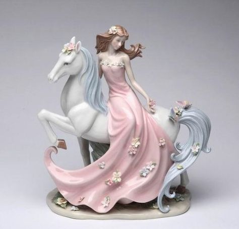 Cosmos 96645 Enchanting Damsel Ceramic Figurine, 11-3/4-Inch Cosmos http://smile.amazon.com/dp/B0077DAEOU/ref=cm_sw_r_pi_dp_6xI7vb00P0MZQ Wedding Sculpture, Porcelain Wedding, Porcelain Sculpture, Musical Gift, Ceramic Figurine, Purple Orchids, Carousel Horses, Glass Figurines, Horse Lovers