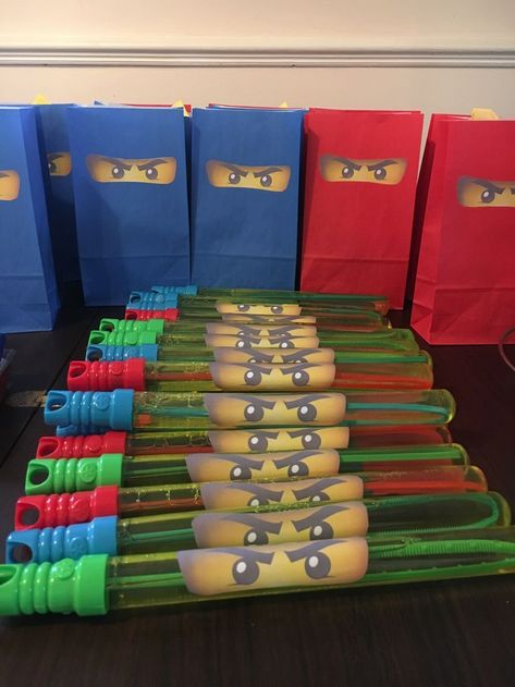 Gift Birth  Lego Ninjago Party Favors / Gift Bags / Ninja Bubble sword #Decoration #homedecor #homedesign #homeideas Ninjago Party Favors, Ninja Themed Birthday Party, Bubble Favors, Festa Power Rangers, Lego Ninjago Party, Lego Ninjago Birthday, Ninjago Birthday Party, Lego Themed Party, Ninja Birthday Parties