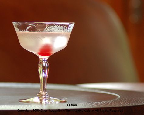 Casino cocktail is a gin based drink ideal for poker themed evenings and parties. {photo credit: Mixologist Cheri Loughlin, The Intoxicologi... Poker Night Drinks Cocktails, Poker Themed Cocktails, Poker Night Cocktails, Casino Theme Cocktails, Casino Themed Drinks Cocktails, Casino Theme Drinks, Casino Cocktails, Maraschino Liqueur, Cocktail Gin