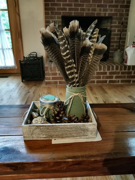 Turkey feather arrangement Turkey Feather Decor, Turkey Hunting Decor, Pheasant Feather Decor, Rustic House Decor, Home Table Decorations, Cape Cottage, Feather Arrangements, Glove Design, Deer Antler Decor