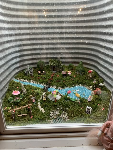 Window well fairy garden turned out great! Window Well Window Treatments, Egress Window Garden, Egress Window Well Decorating Ideas, Basement Window Landscaping, Window Well Garden Basement, Window Well Plant Ideas, Window Well Landscaping, Egress Window Ideas Decor, Window Well Plants