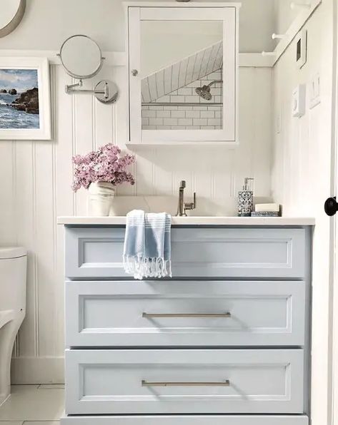 37 Best Blue Gray Colors for Cabinets in Kitchen and Bathrooms Pale Blue Kitchen Cabinets, Bathroom Cabinet Color Ideas, Powder Blue Bathroom, Robins Egg Blue Bathroom, Cabinets In Kitchen, Bathroom Cabinet Colors, Sherwin Williams Blue, Grey Bathroom Cabinets, Painted Vanity Bathroom