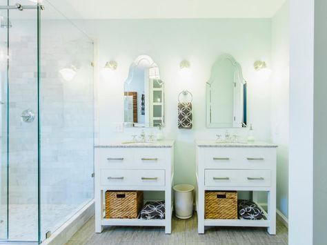 This bathroom features two single vanities placed side by side, to give a double vanity look without a double vanity price. Using white and soft gray colors with the clear glass shower door and mirrors amplify the space. Unique Bathroom Mirrors, Bathroom Vanity Designs, Small Bathroom Vanities, Vanity Design, Double Vanity Bathroom, White Vanity, Vanity Storage, Unique Bathroom, Bathroom Redo