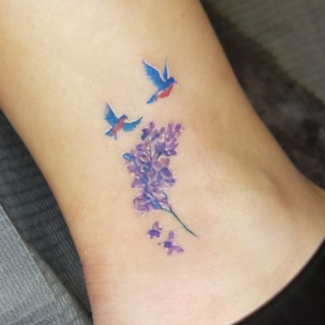 Blue birds and lilacs ❤ Chickadee And Lilac Tattoo, Bluebird Tattoo Meaning, Plumeria Tatoos, Blue Bird Tattoos For Women, Simple Lilac Tattoo, Blue Bird Tattoo, Colorful Bird Tattoos, Tribute Tattoo, Word Tattoo Ideas