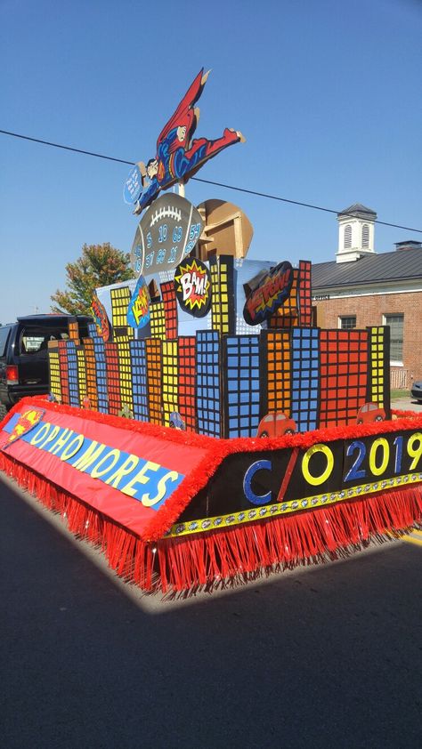 Hugh School float Superman Parade Float, Superhero Christmas Parade Float, Superhero Parade Float Ideas, Super Hero Parade Float Ideas, Superhero Float Parade, Hoco Float Ideas, Homecoming Float Ideas High School, Parade Float Theme, Business Moodboard