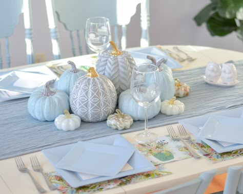 Decorate your table this fall with beautiful blue and grey pumpkins that have a chalky texture. You don't have to go traditional with fall colors! Mix it up and create a stunning display with these cooler tones.   Featuring Mia Charro designer napkins Blue Fall Decorations, Blue Grey Fall Decor, Blue Pumpkin Centerpiece, Blue And White Pumpkin Decor, Blue And White Fall Table Decor, Blue Pumpkin Decor, Blue Pumpkin Centerpieces Fall, Blue Pumpkin Baby Shower Ideas, Light Blue Pumpkin Decor