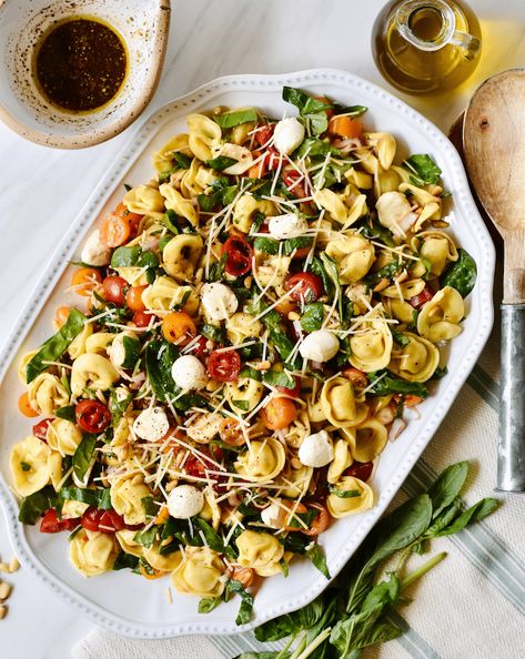 Tortellini Caprese Salad Tortellini Caprese Salad, Creamy Tortellini, Fresh Spinach, Toasted Pine Nuts, Pine Nuts, Parmesan Cheese, Tortellini, Caprese Salad, Parmesan