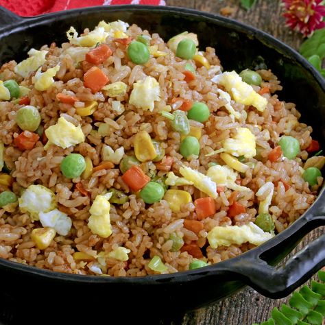 Turn your day-old rice into this delicious Chao Fan. This Chinese-style vegetable-studded fried rice is super easy to make and is as good as anything you've had at your fave Chinese restaurants! | www.foxyfolksy.com #FoxyFolksyRecipes #friedrice #chinesefriedrice #chaofan Chao Fan Recipe Fried Rice, Chinese Fried Rice Recipe, Mix Vegetable Recipe, Vegetable Fried Rice Recipe, Chinese Fried Rice, Foxy Folksy, Making Fried Rice, Chinese Restaurants, Vegetable Fried Rice