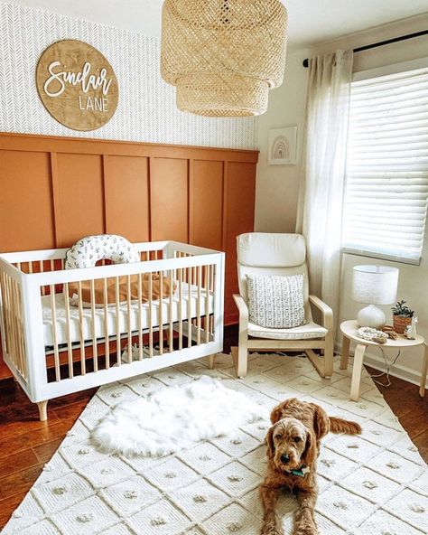 We've seen SO many gorgeous moody green board + batten walls, but this nursery makes us wonder - is burnt orange up next? 📸: @justspennpenn Nursery Ideas Burnt Orange, Burnt Orange Accent Wall Nursery, Burnt Orange And Cream Nursery, Orange Gender Neutral Nursery, Rustic Orange Nursery, Rust Nursery Decor, Terracota Nursery Ideas, Light Orange Nursery, Burnt Orange Baby Nursery