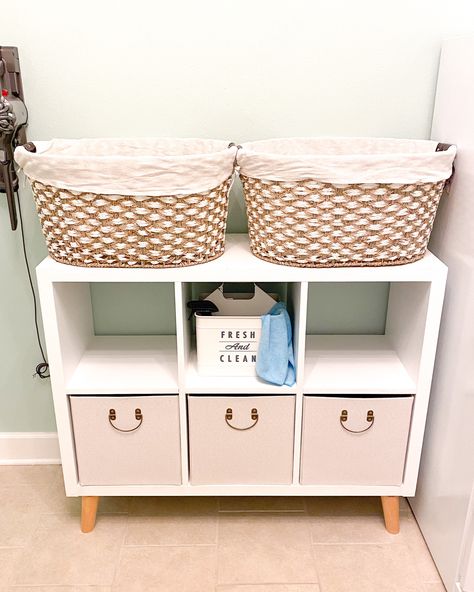 White storage cube, wooden feet, Seagrass laundry baskets, storage cubes, laundry decor Adding Feet To Cube Storage, Laundry Storage Ideas, Laundry Room Refresh, Diy Cube Storage, 6 Cube Organizer, Boho Farmhouse Decor, Affordable Storage, Organizer Shelf, Storage Cube