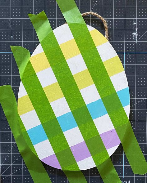 Buffalo Plaid Door Hanger Diy, Plaid Painting Diy, Easter Egg Door Hanger Wood, Buffalo Plaid Painting Diy, Wooden Egg Decorating Ideas, Diy Easter Door Hanger, Painted Wooden Eggs Easter Ideas, Painting Buffalo Plaid Diy, Diy Easter Painting