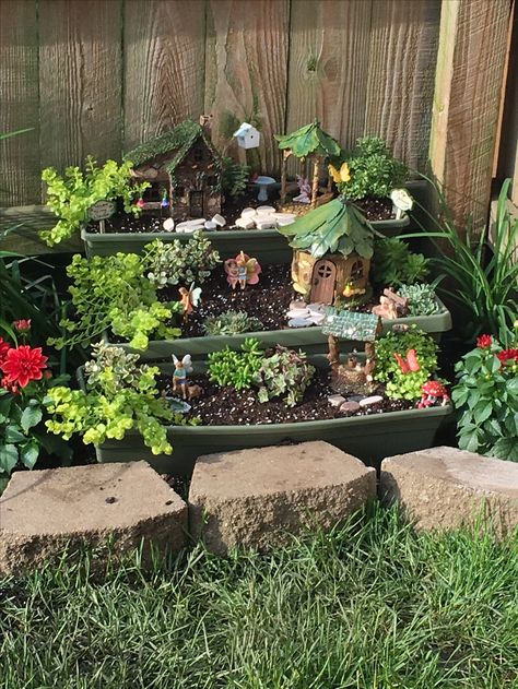 My fairy garden! Garden Rockery, Fairy Herb Garden, Fairy Garden Box, Whimsy Garden, Backyard Improvements, Retro Fairy, Fairy Garden Pots, Smurf Village, Garden Goals