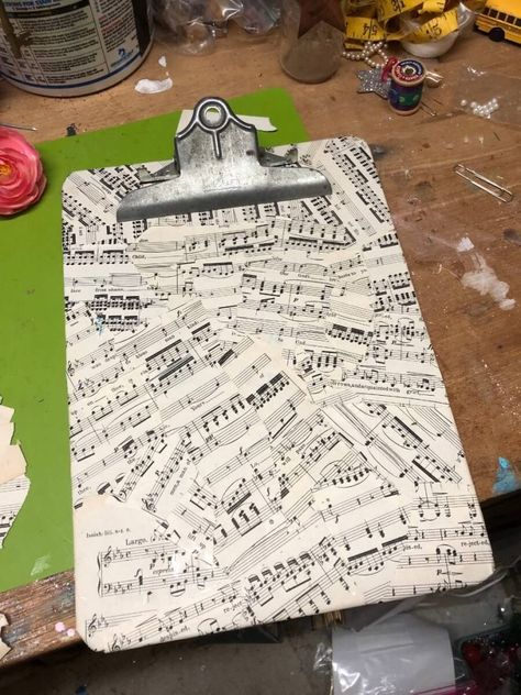 vintage style decorative clipboard covered with vintage music paper (900x1200) Music Paper Crafts Diy, Decoupage Clipboards, Clip Board Ideas, Vintage Clipboard, Decorative Clipboards, Scrapbook Paper Wall Art, Chipboard Projects, Clipboard Wall Art, Clipboard Ideas