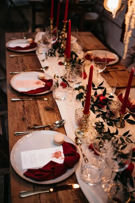 Wooden Table Red Candles Napkins Greenery Decor Bold Wedding Ideas Pasha Jansen Photography #wedding #weddingtable #weddingdecor Burgundy Dinner Table Decor, Christmas Engagement Table Decoration, Winter Wedding Table Decorations Elegant, Burgandy Wedding Decorations Table Settings, Moody Red Wedding, Red Anniversary Decorations, Red Aesthetic Wedding, Round Table Wedding Decor Burgundy, Red Candles Wedding