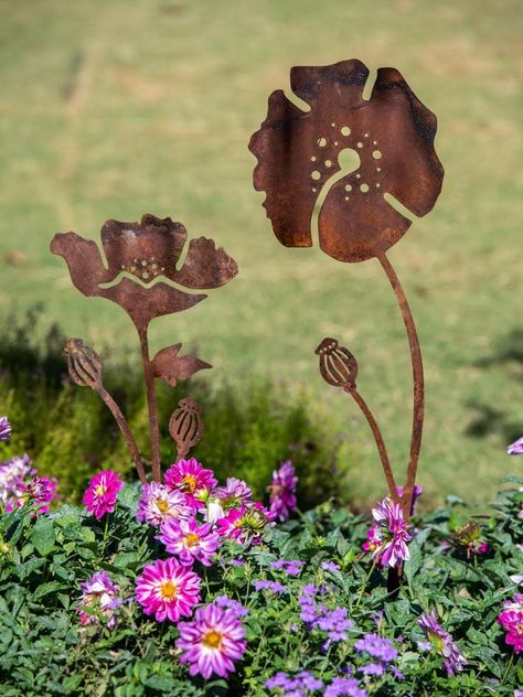 PRICES MAY VARY. PRODUCT DETAILS: Poppy Garden Stakes Set of 2 Decorative Corten Steel Flower Stakes add height and visual interest to your garden in any season. With the largest Poppy Standing 34" High when installed with the metal stakes into your garden, they are bound to add eye catching charm! BEST USE AS: Outdoor Garden or Landscape decoration These charmingly rustic poppy stakes bring a festive pop of floral finery that adds height and visual interest to garden beds, container plantings, Flower Stakes, Cozy Garden, Poppy Garden, Garden Pond Design, Patio Projects, Decorative Garden Stakes, Chicken Garden, Garden Wedding Decorations, Steel Flowers