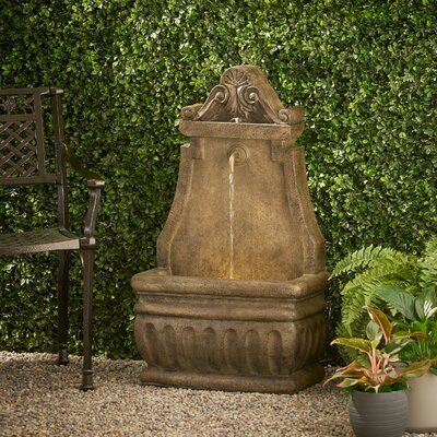 Create a charming look in your outdoor space with an accessory that brings a soothing cascade of water to your home. Our garden fountain features a calm waterfall flow that continuously circulates using an included pump, bringing a classic look to any backyard or patio. Crafted with an incredibly durable polyresin material, this decorative accessory offers a weather-resistant structure that allows outstanding attention to detail. Finished with a classic single-spout design and enchanting underwa Patio Fountain, Cement Patio, Fountain Feature, Outdoor Fountain, Underwater Lights, Wall Fountain, Garden Fountain, Fountains Outdoor, Garden Fountains