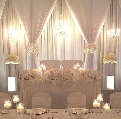 800x800 1476982555768 all white backdrop with 3 chandaliers Head Table Wedding Backdrop, Wedding Reception Head Table, Reception Head Table, Head Table Backdrop, Wedding Hall Decorations, Fun Wedding Decor, Reception Backdrop, Head Table Wedding, Wedding Reception Backdrop