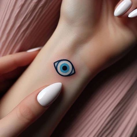 Evil Eye Tattoo Ideas, Greek Evil Eye Tattoo, Eye Tattoo Ideas, Nape Tattoo, Evil Eye Tattoo, Evil Eye Hand, Greek Evil Eye, Eye Tattoo, Blue Evil Eye