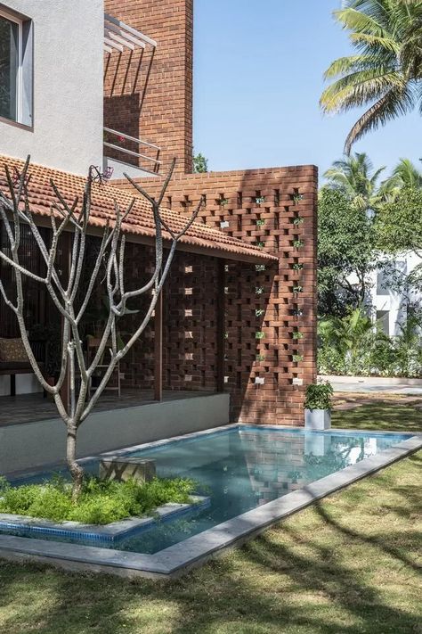 This Home Borrows Vernacular Design Elements | Silhouette Architects & Designers Vernacular Design, 2 Story House Design, Shimmering Water, Wall Molding Design, Carport Garage, Bungalow Exterior, Tata Motors, Vernacular Architecture, Material Palette